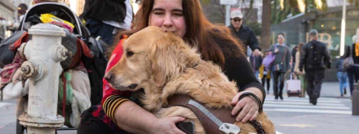 visually impaired woman with service dog
